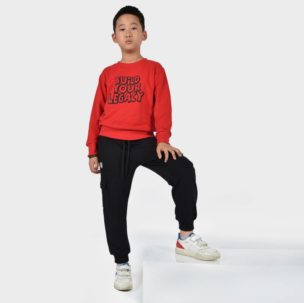 ANTETOKOUNBROS Kids' Cargo Sweatpants Build Your Legacy Black Model Front Boy